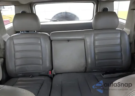 2003 Hummer H2 z USA, uszkodzony, nr VIN 5GRGN23U63H131139